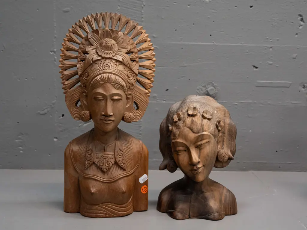 2 intricately carved hardwood bust figures, shorter one marked Sanur Bali, taller has tiny crack in headpiece H-340 Image 1++