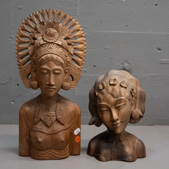 2 intricately carved hardwood bust figures, shorter one marked Sanur Bali, taller has tiny crack in headpiece H-340