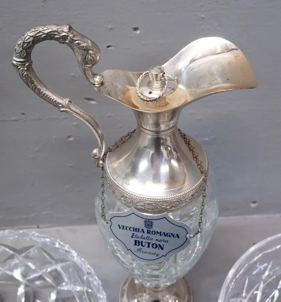 2 cut crystal bowls and a cut glass brandy ewer decanter with plated fittings, Buton brandy metal label and Distillerie Image 1++