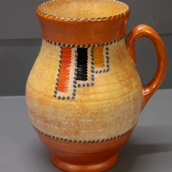 Crown Ducal deco style handled jug vase with orange and gold glaze H-210 W-150 handle to rim