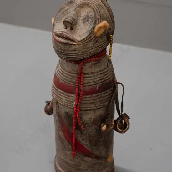 tribal style pottery figure with beads and shells, remnant fur or wool decoration H-230