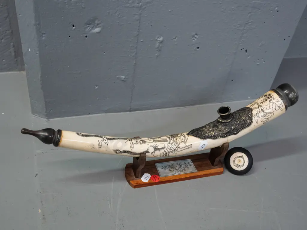 Chinese ornamental pipe - scrimshaw style decoration on bone or faux-bone composite w/ horn ends, on display stand L380 Image 1++