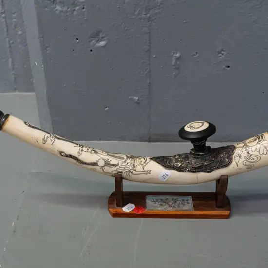 Chinese ornamental pipe - scrimshaw style decoration on bone or faux-bone composite w/ horn ends, on display stand L380