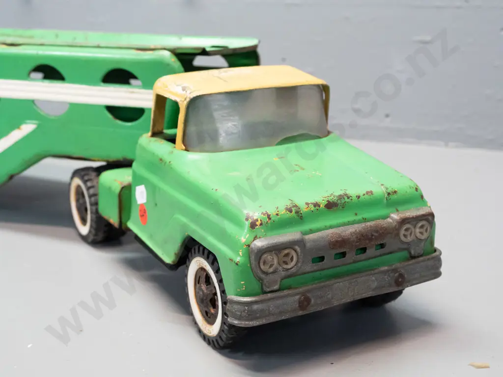 vintage tin toy car transporter truck and trailer, wheels marked Tonka - overall paint wear, corrosion, denting, small Image 1++