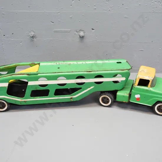 vintage tin toy car transporter truck and trailer, wheels marked Tonka - overall paint wear, corrosion, denting, small