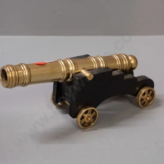 small polished brass ornamental cannon on wooden carriage with brass wheels H-90 L-210