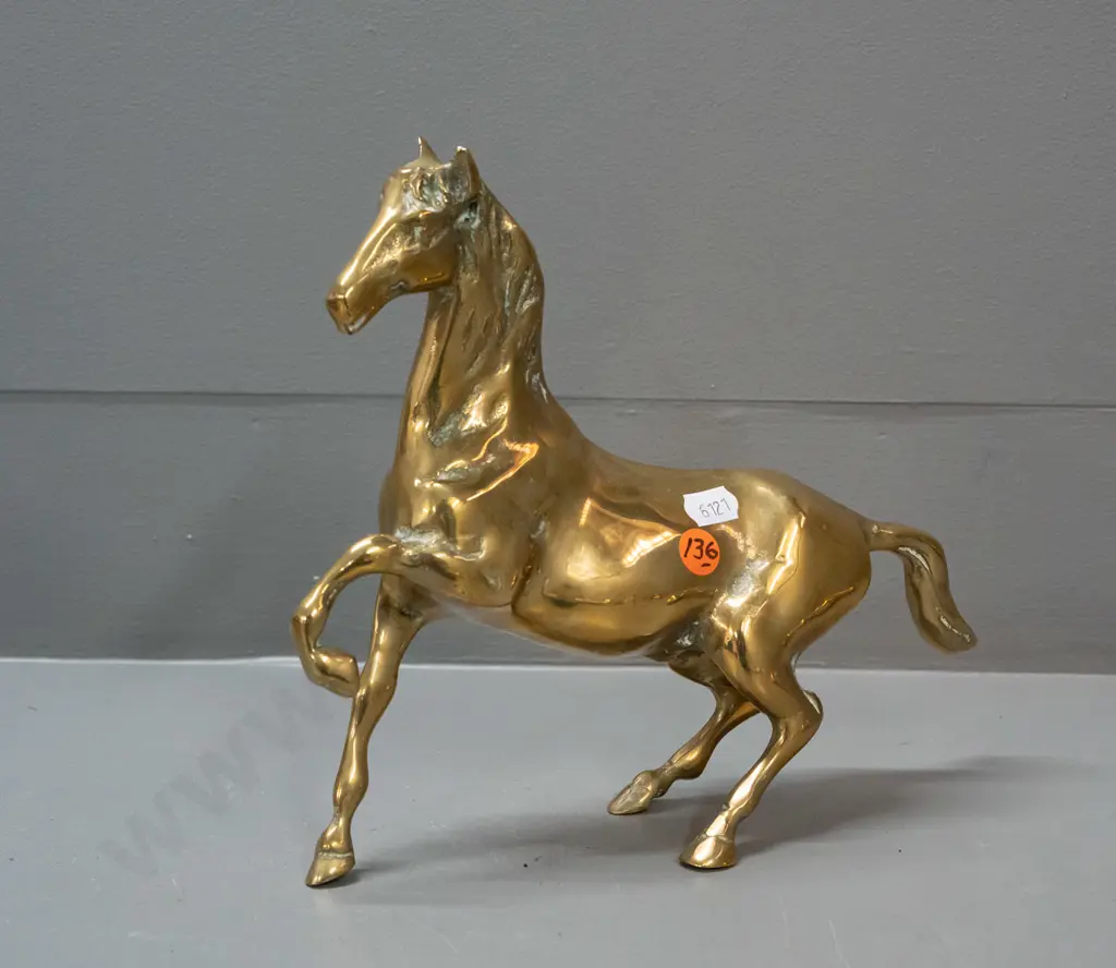 polished cast brass horse figure with one foot raised H-200 L-210 Image 1++