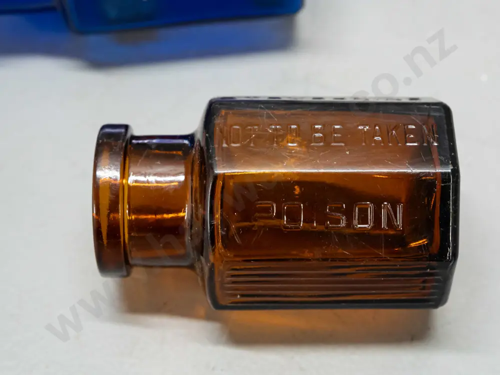 6 glass hexagonal faceted bottles, 4 cobalt blue and the amber bottle marked Strychine - Not to be Taken - Image 1++