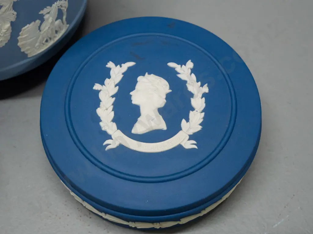 4 pieces of blue Wedgwood jasper ware including 2 lidded trinkets, one is dark blue 1977 Silver Jubilee. Larger vase is Image 1++