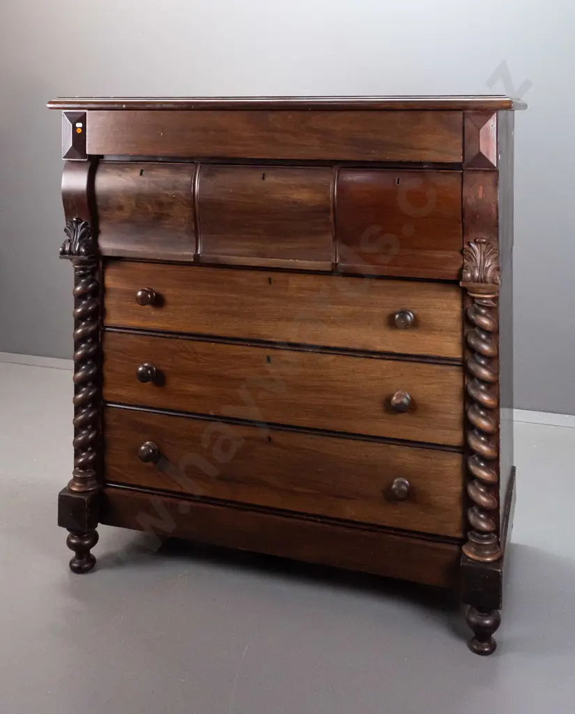 Victorian mahogany 7-drawer chest with 3 shaped top drawers, 3 with wooden knobs, turned half columns, on bun feet. Image 1++