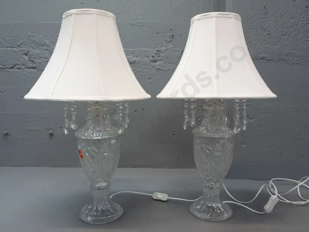 pair of clear moulded glass table lamps with fluted circular foot, ring of hanging lustres and waisted, panelled shades Image 1++