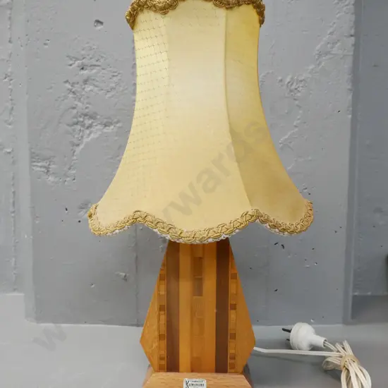 Sovereign ware Kaimanawa lamp w/ original label, label to base listing native timbers, waisted panelled shade. Going.