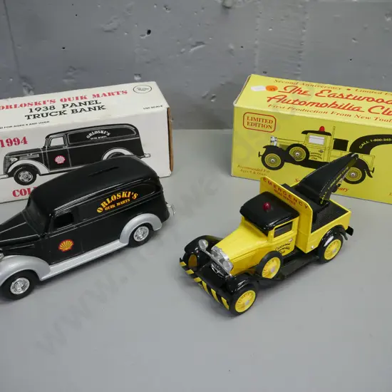 2x die-cast 1:25 scale automobile money banks w/ original boxes: 1931 Ford wrecker truck & 1938 panel truck.
