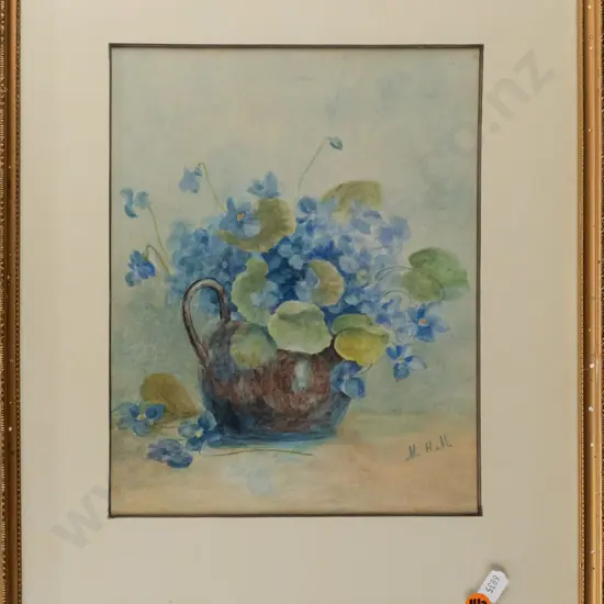 M.H.M -- framed watercolour on paper, still life w/ blue flowers in jug, H-245 W-195 [light fading]