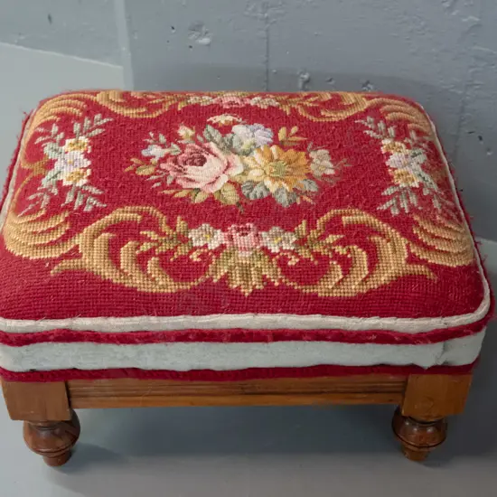 Edwardian rimu foot-stool with turned feet - chip to one foot, sporadic borer, some wear to needlework upholstery H-200