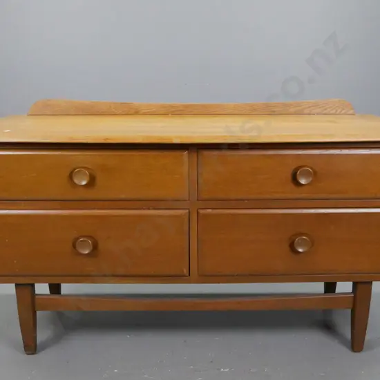 oak & rimu mid-century low 4-drawer chest with turned wooden knobs in slight recess, stretcher base with square