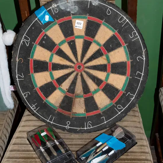 dart board and darts