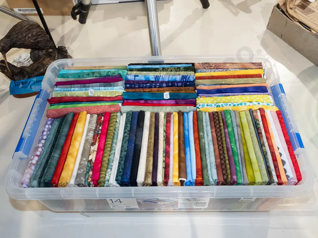 container of fabric pieces Image 1++