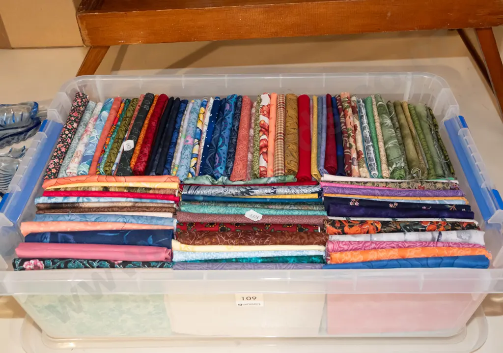 plastic tub of fabric pieces Image 1++