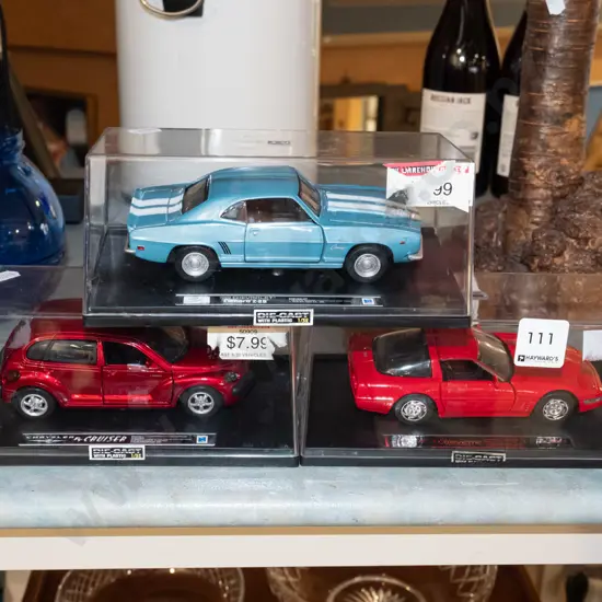 3x cased diecast model vehicles