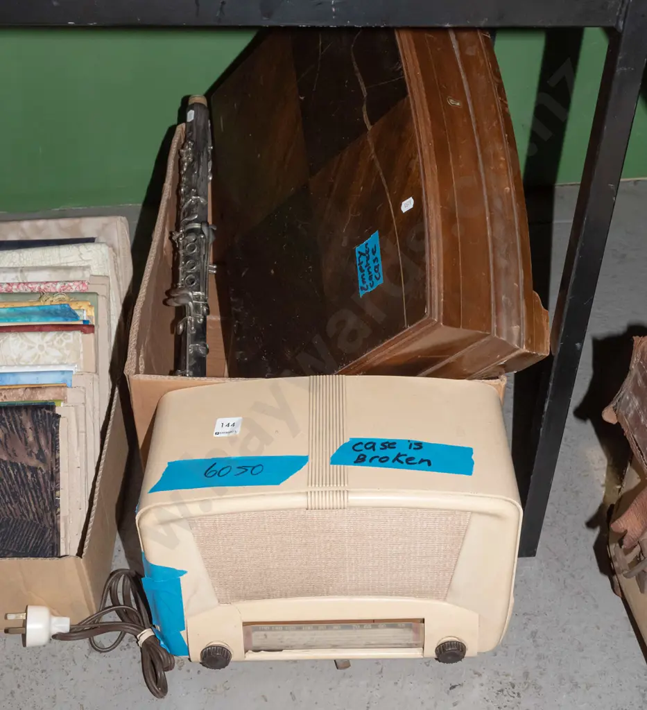 box; part clarinet, cutlery canteen, valve radio with damage to case Image 1++