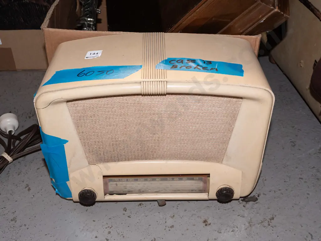 box; part clarinet, cutlery canteen, valve radio with damage to case Image 1++