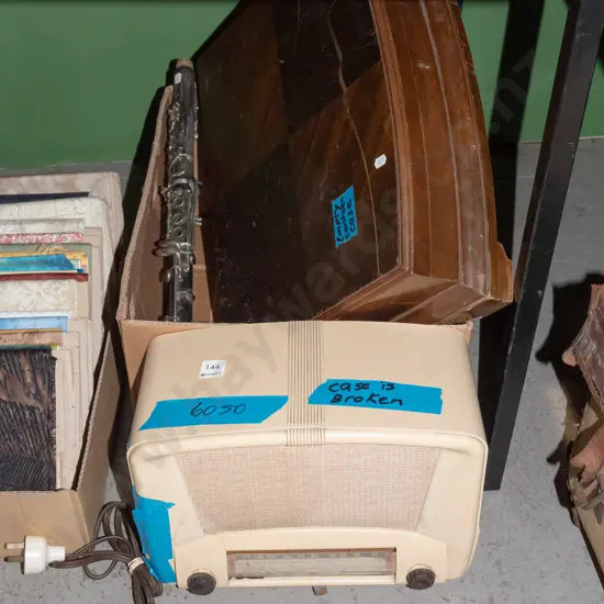 box; part clarinet, cutlery canteen, valve radio with damage to case
