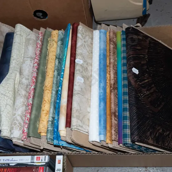box of fabric pieces