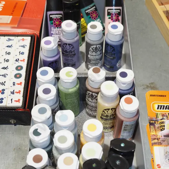 box of acrylic paints