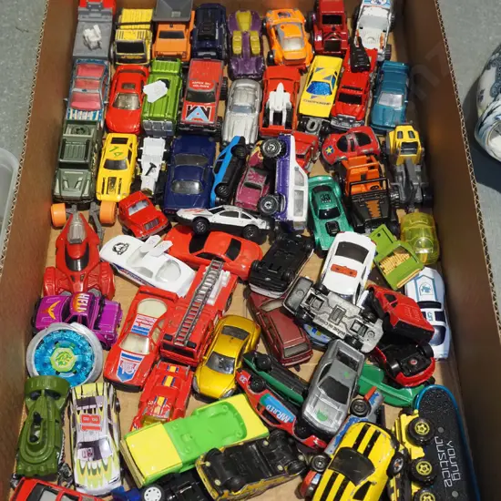 box of toy vehicles