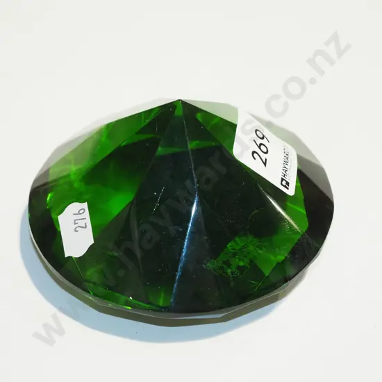 cut green glass paperweight