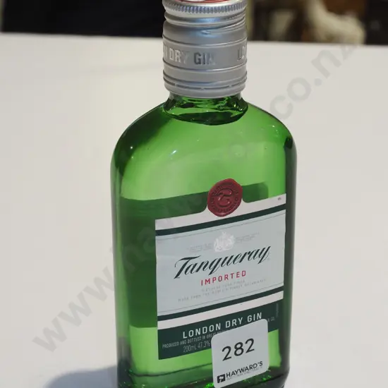 hip flask of Tanqueray gin