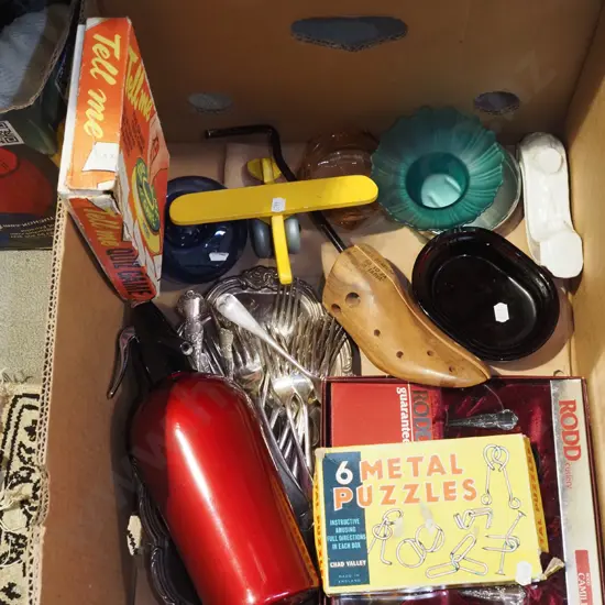 box; soda syphon, cutlery, puzzles etc
