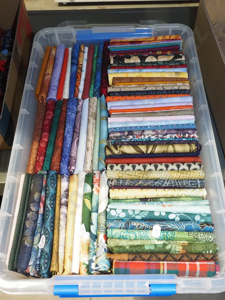 box of fabric pieces Image 1++