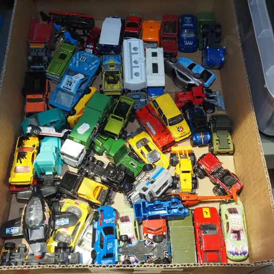box of toy vehicles