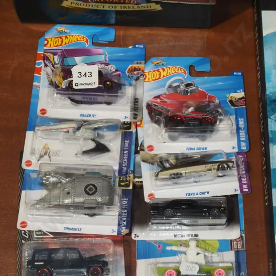 8x as new carded Hotwheels model vehicles