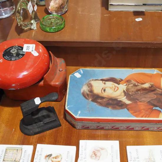tin; fire alarm bell, hole punch