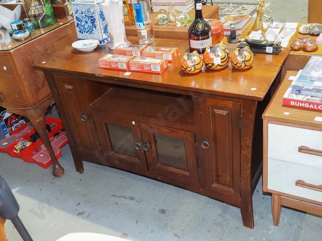 pine entertainment unit with 2 glazed doors and 2 solid pine doors covering CD storage racks Image 1++