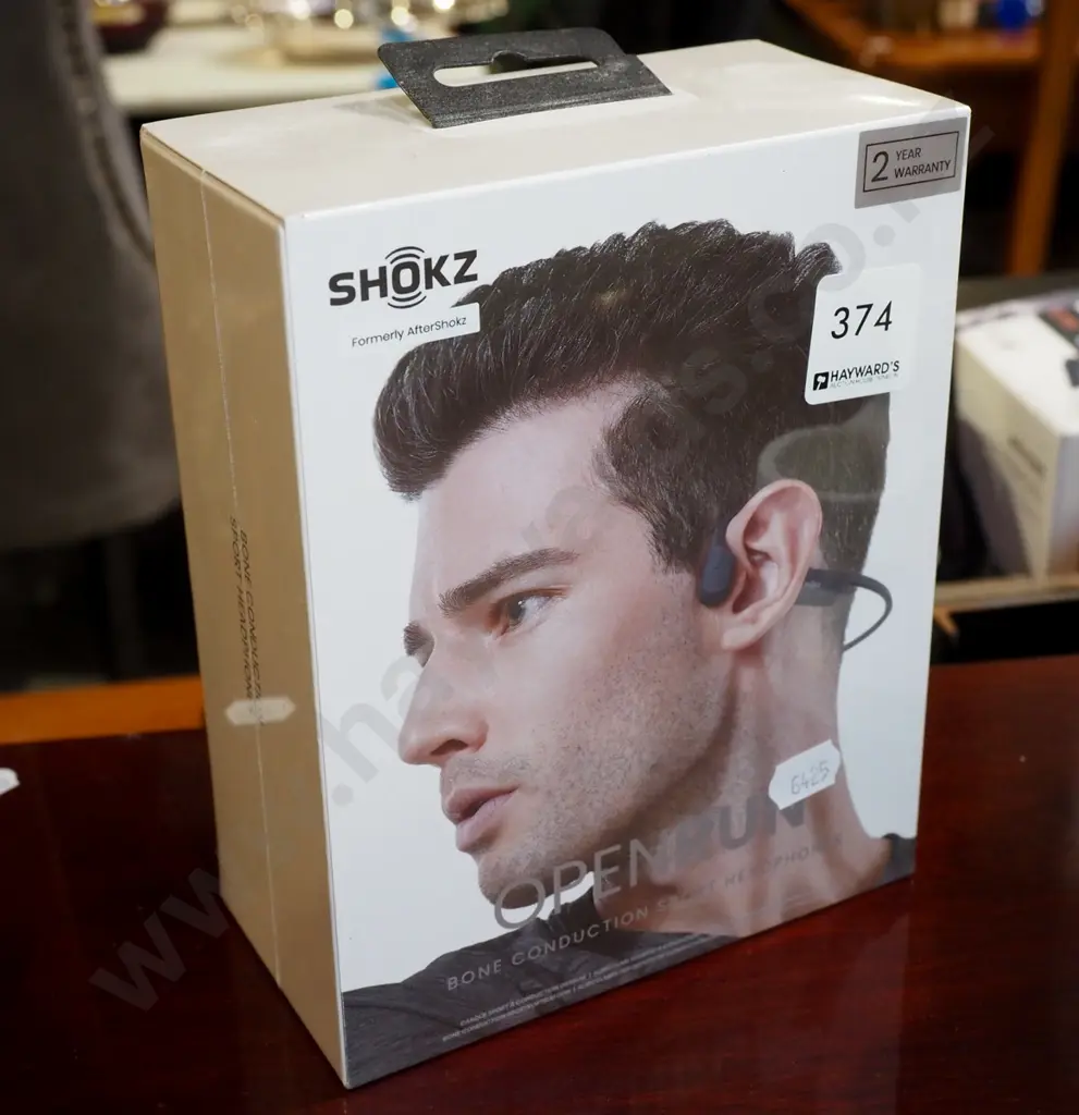 as new Shokz bone conduction head phones Image 1++