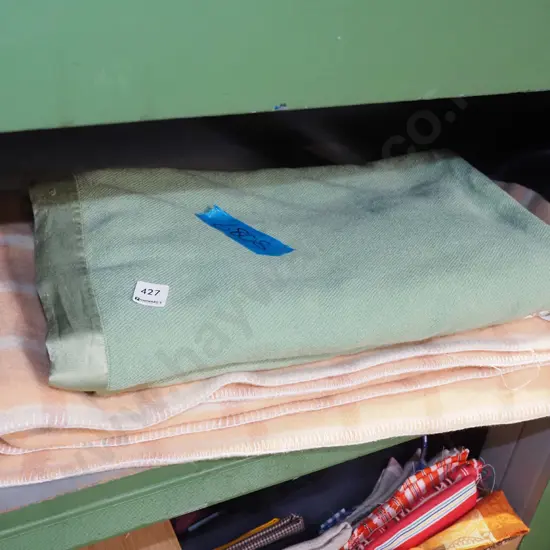 pink and green woollen blanket