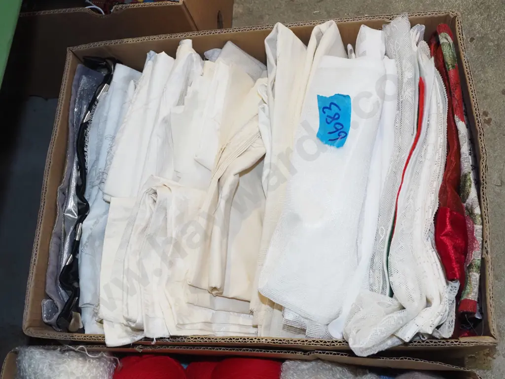 box of fabric pieces Image 1++