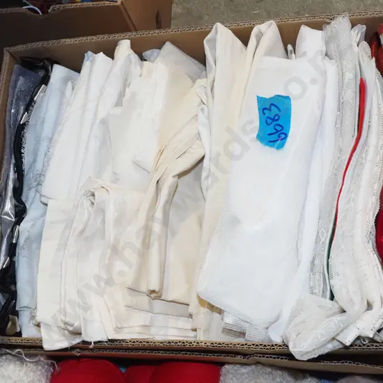 box of fabric pieces
