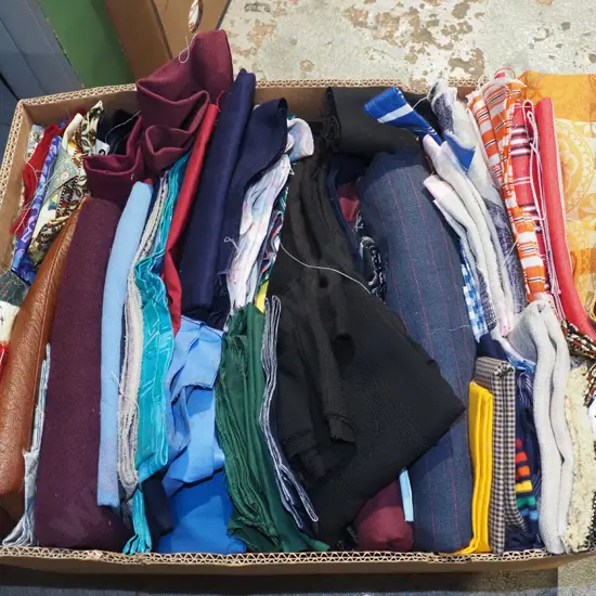 box of fabric pieces