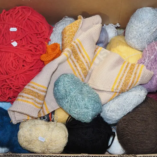 box of various knitting yarns