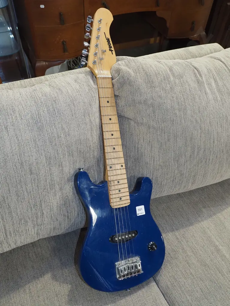 Probe child's electric guitar Image 1++