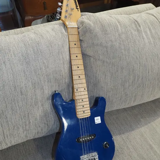 Probe child's electric guitar