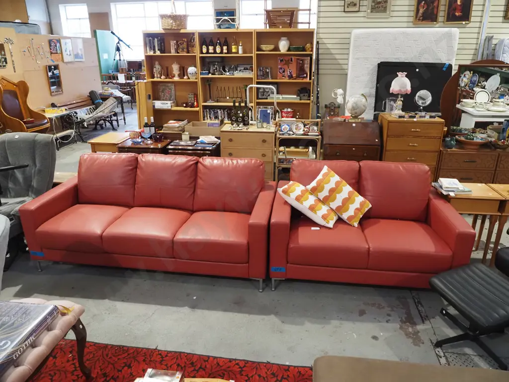 light red leather upholstered 2 piece lounge suite - 3 seater, 2 seater - excellent condition Image 1++