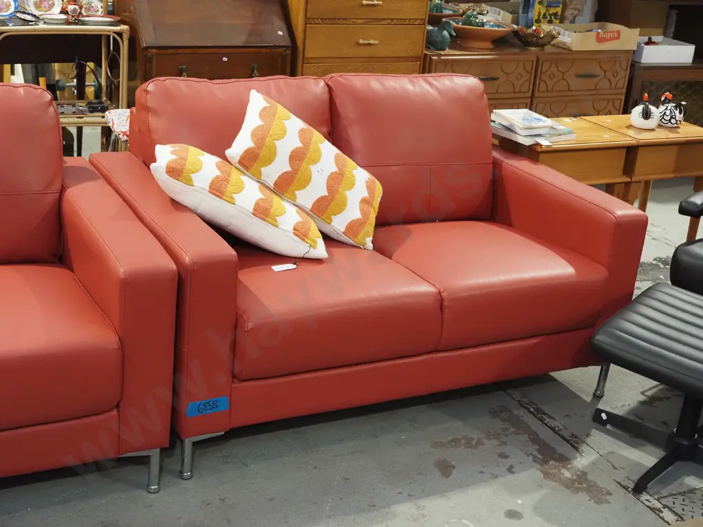 light red leather upholstered 2 piece lounge suite - 3 seater, 2 seater - excellent condition Image 1++