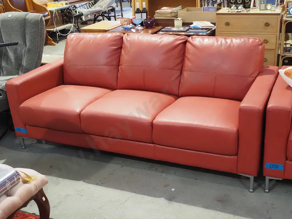 light red leather upholstered 2 piece lounge suite - 3 seater, 2 seater - excellent condition Image 1++