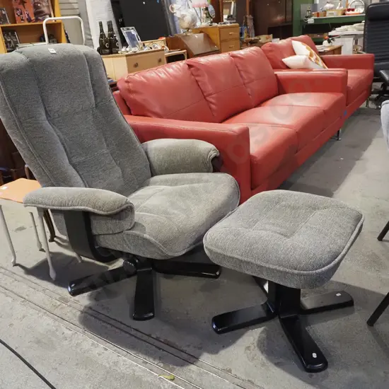 grey upholstered swivel reclining armchair with matching footstool - marks to fabric